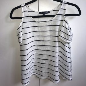 Off the shoulder striped shirt sleeve.